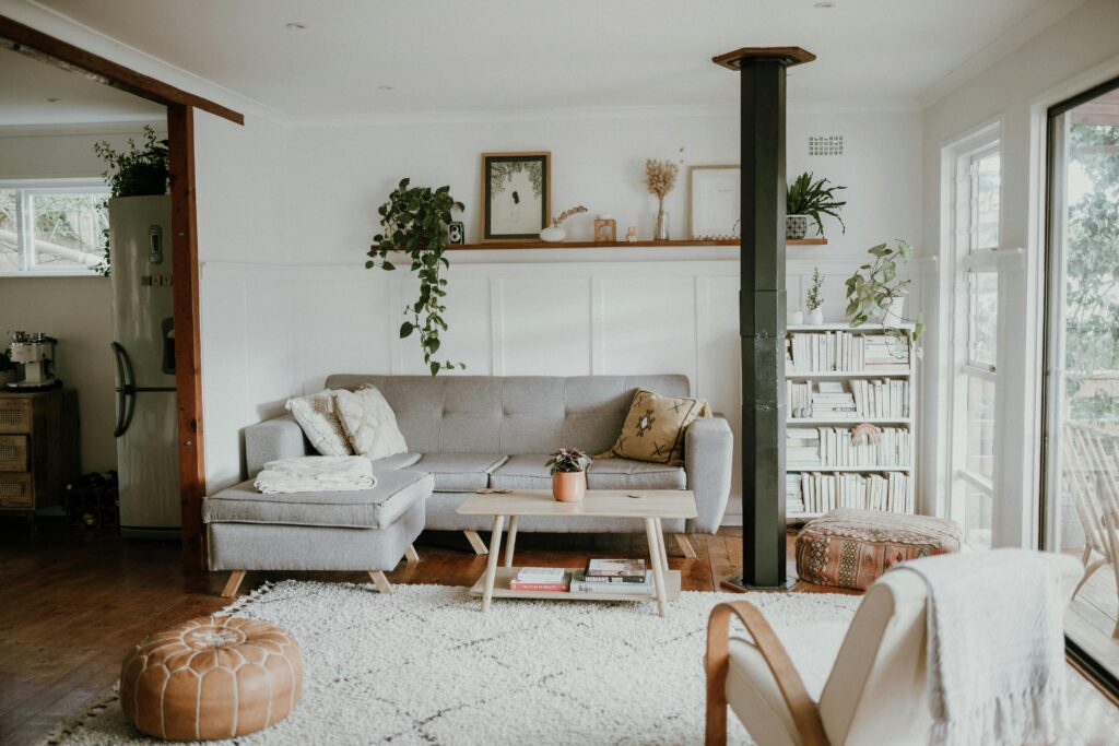 Bright and airy Scandinavian design living room with elegant decor and lush greenery.